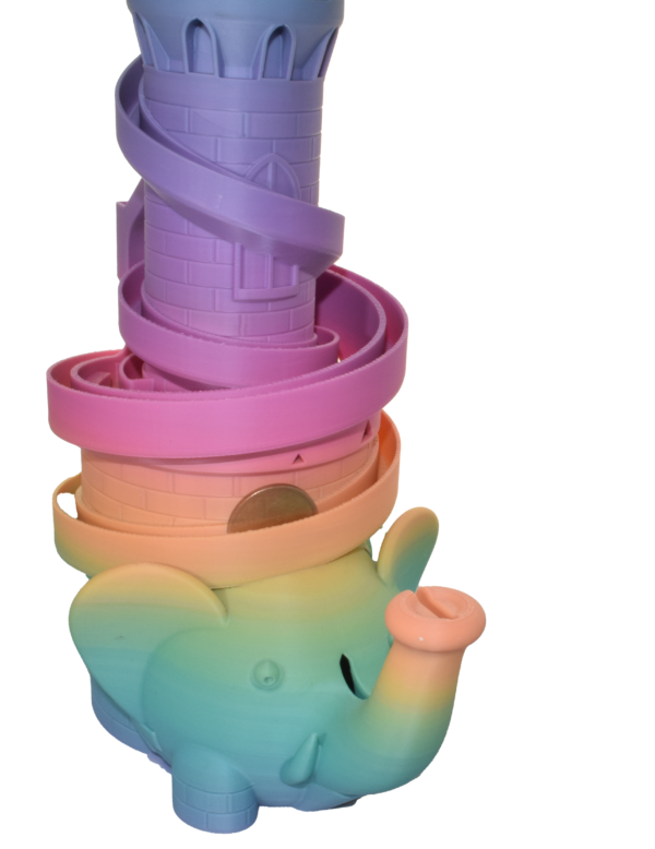Coin sliding down coin bank tower on elephant
